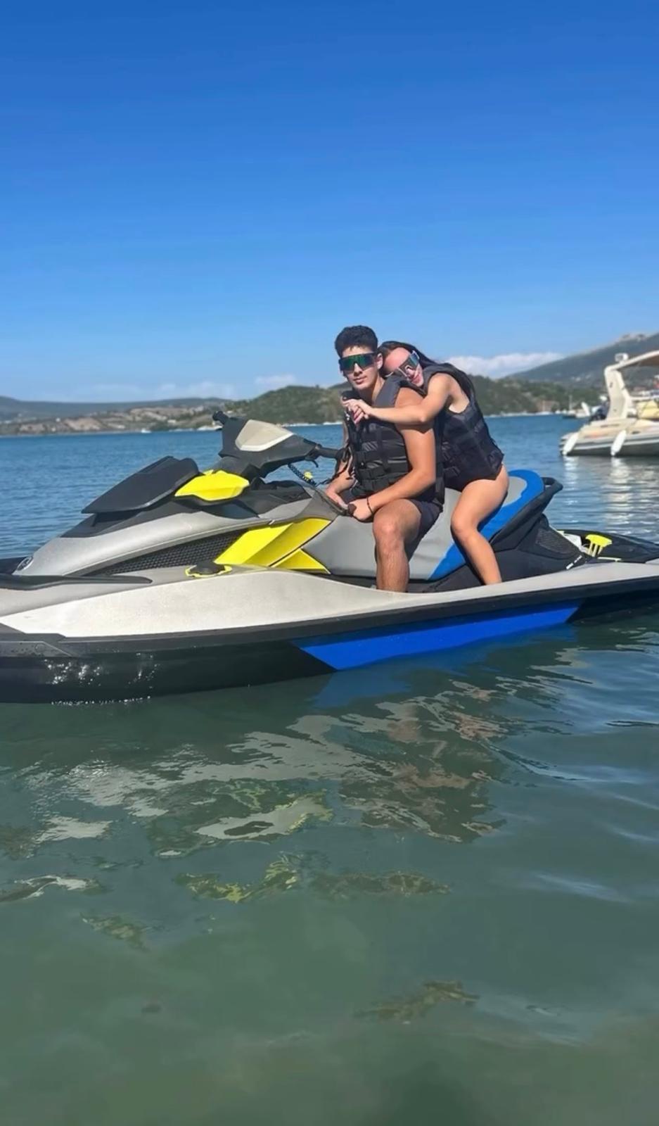 Couple on the bay, Sunglasses, smiles, and a full tank